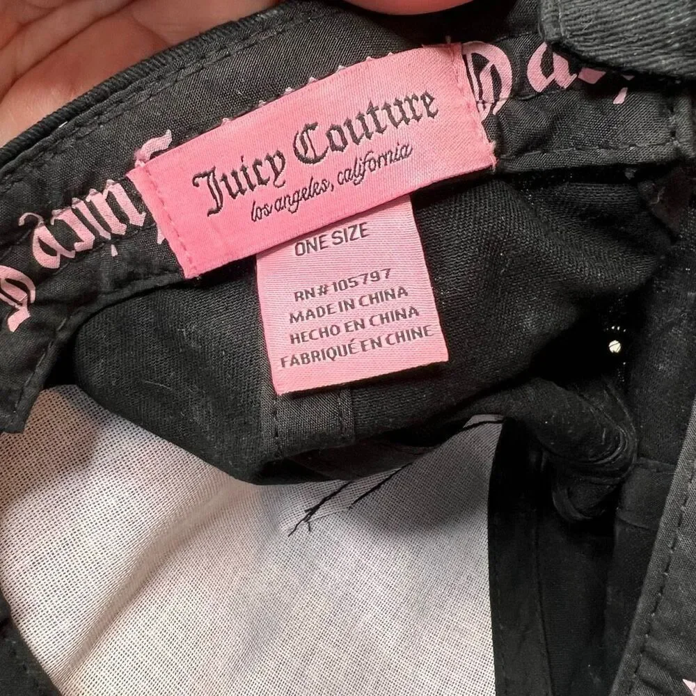 This item is a black Juicy Couture baseball cap featuring a rhinestone logo